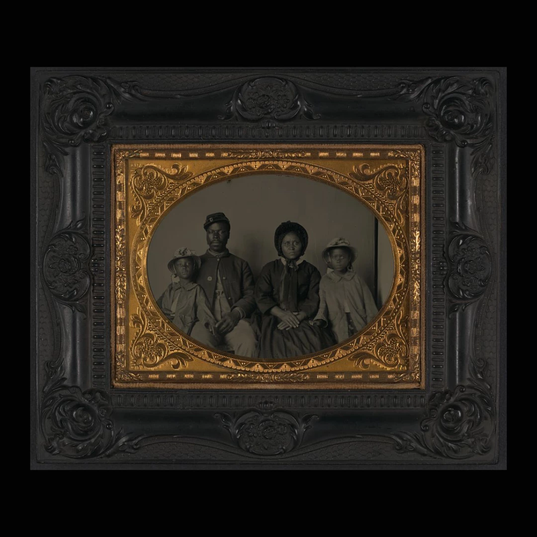 USCT Soldier Takeover the Network A photograph of an unnamed USCT soldier with his wife and two daughters.