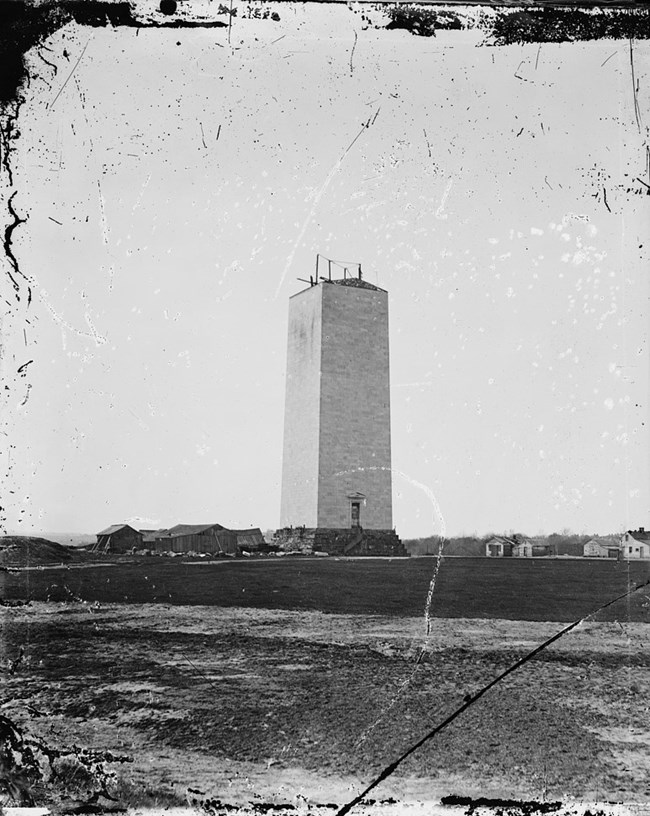 Washington Monument 1860 Black and white photo of unfinished Washington Monument about 150 feet high