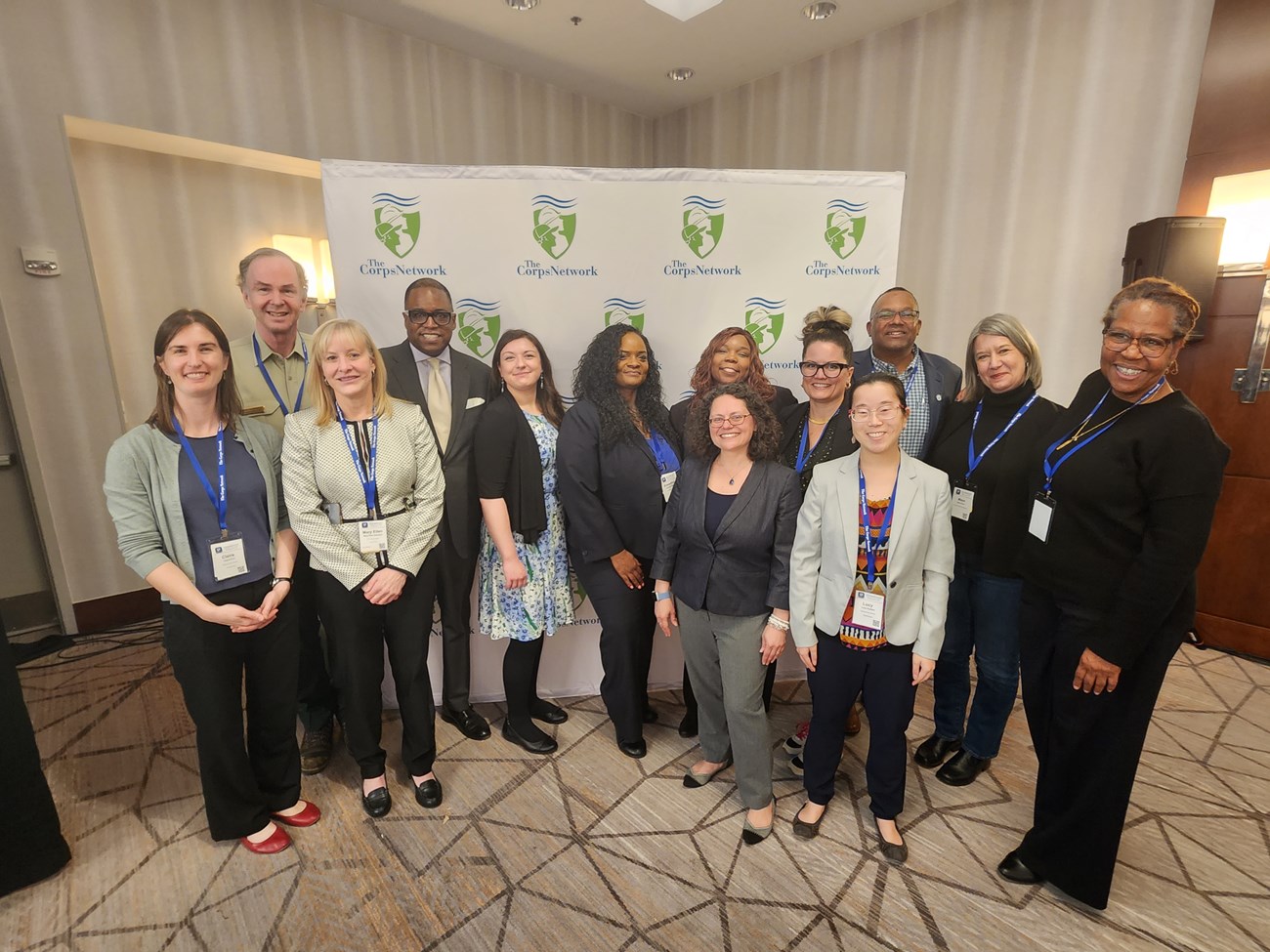 Group photo of individuals at a conference