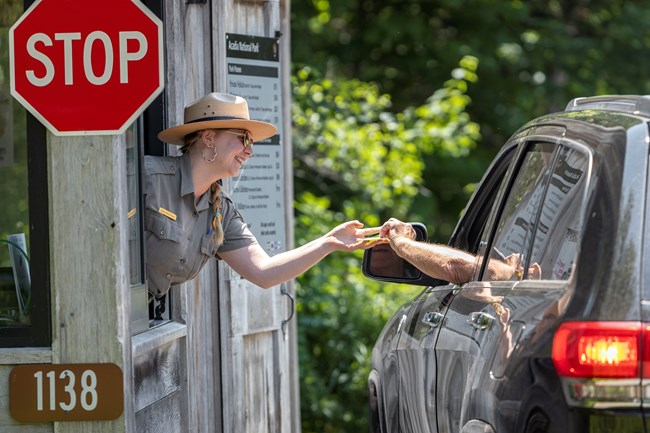 Stef's employee works the entrance booth at Sand Beach