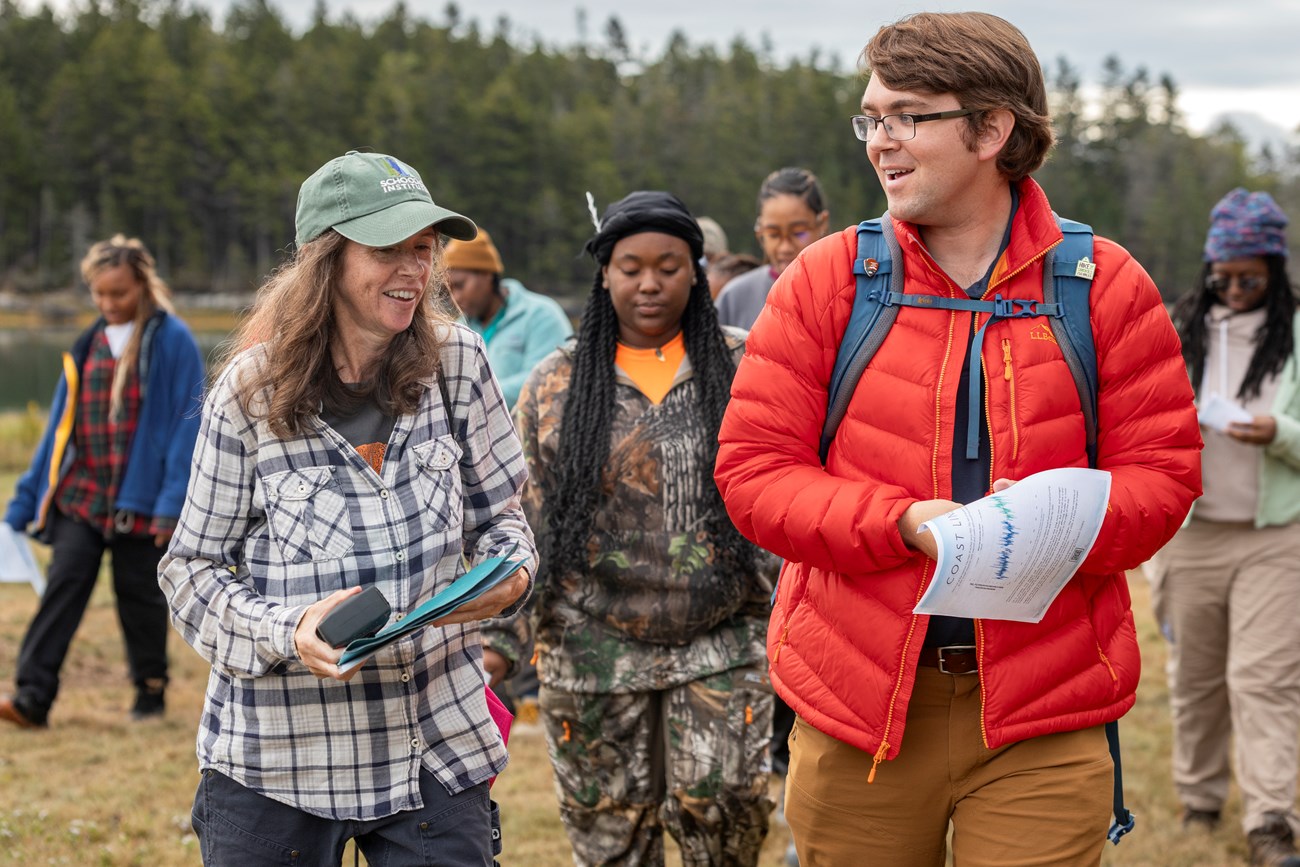 Catherine leads a group of college students on a field trip. Catherine leads a group of college students on a field trip.