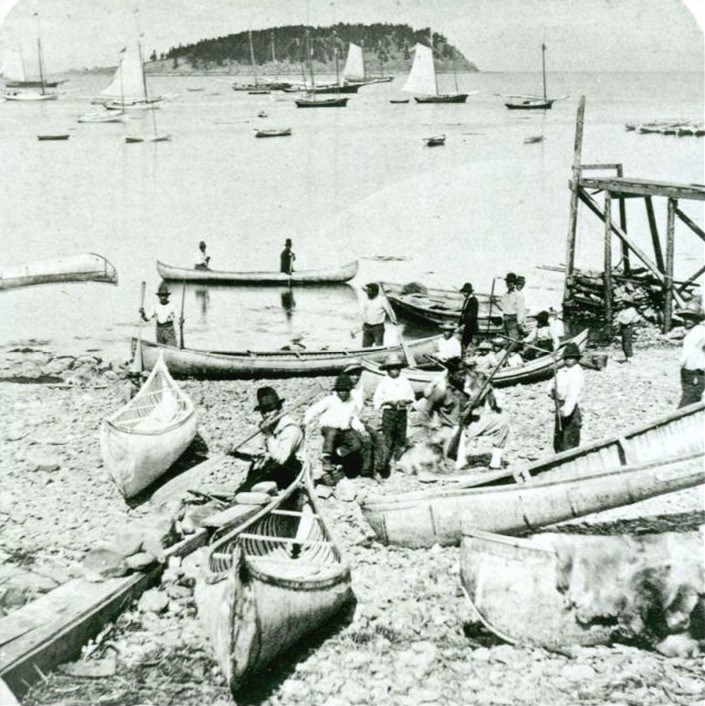 Figure 1. Wabanaki ready to provide canoeing, guiding, and hunting services along the shoreline of Bar Harbor, 1881 (Prins 2007). Figure 1. Wabanaki ready to provide canoeing, guiding, and hunting services along the shoreline of Bar Harbor, 1881 (Prins 2007).