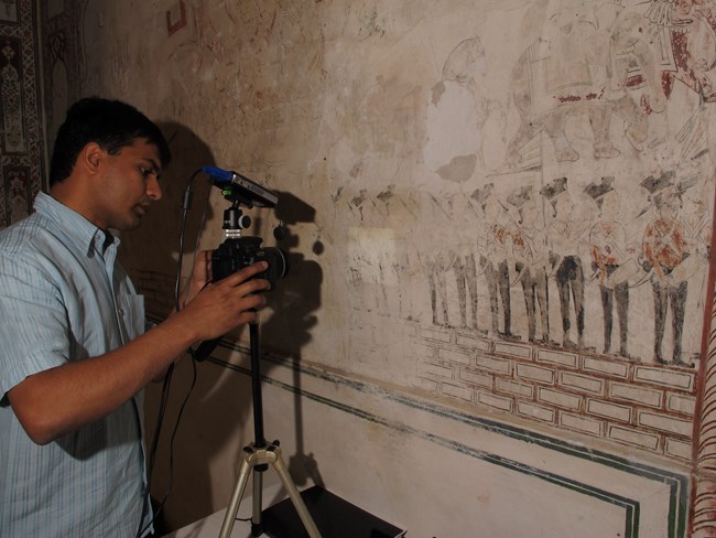 Satish Pandey preforming 3D documentation of deterioration in wall paintings in Nagaur Fort, India. Satish Pandey preforming 3D documentation of deterioration in wall paintings in Nagaur Fort, India.