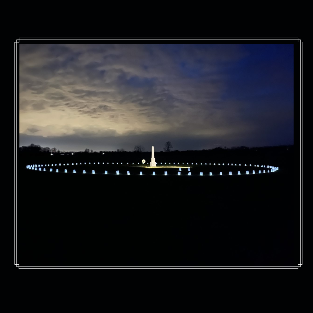 Camp Nelson Cemetery Obelisk Luminary Takeover the Network A modern photograph of the cemetery obelisk, surrounded by 102 lanterns, signifying those refugees who died in the November 1864 expulsion.