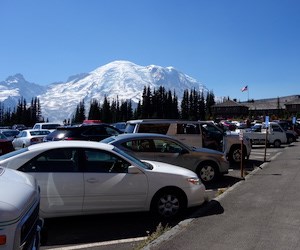 Full parking at Sunrise A full parking lot in front of a view of Mount Rainier.