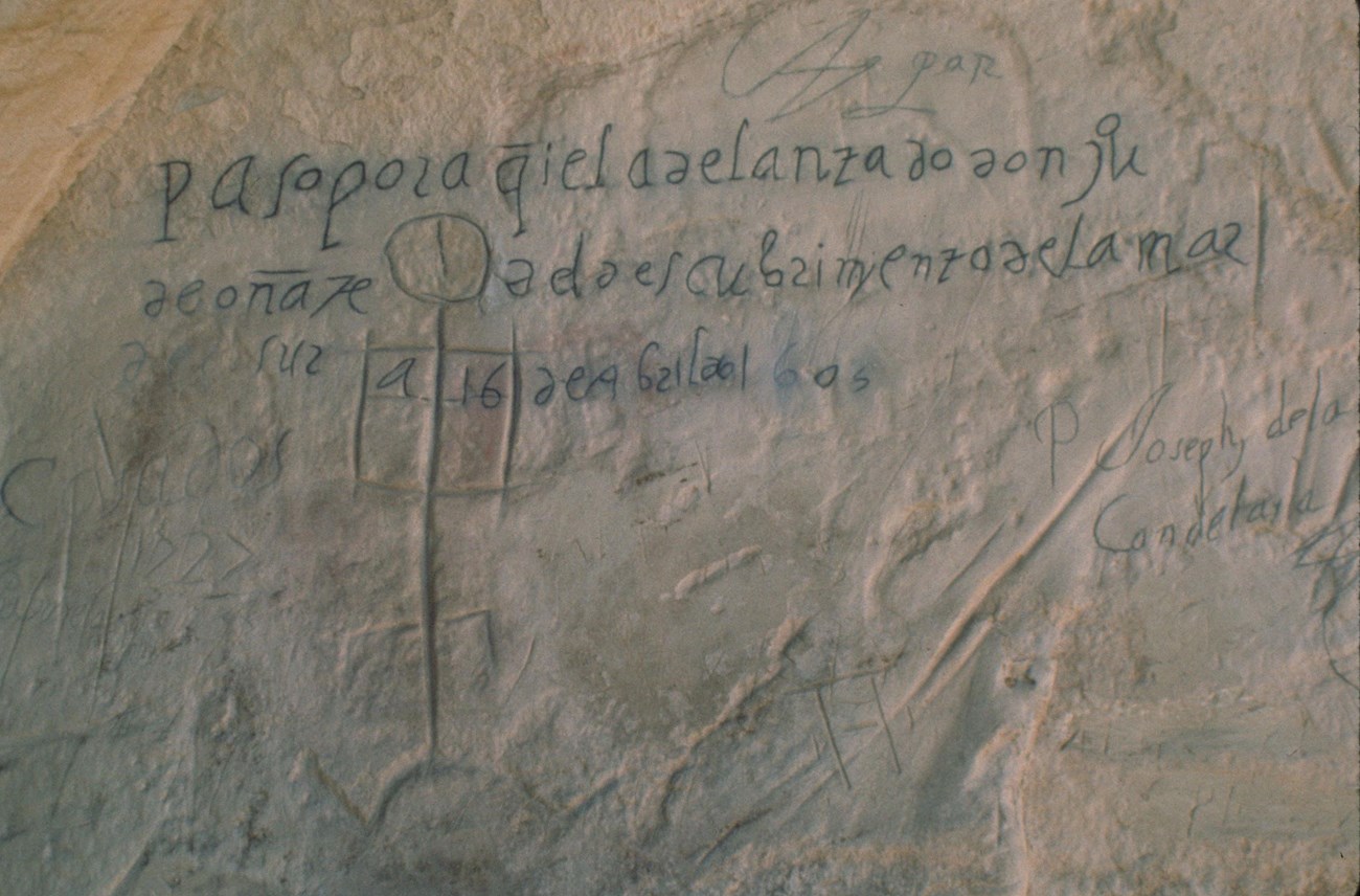 2c--b679aea2-f36d-42b0-ba8c-2eed2325b3d8CROP Inscriptions left by the Spanish at El Morro National Monument.