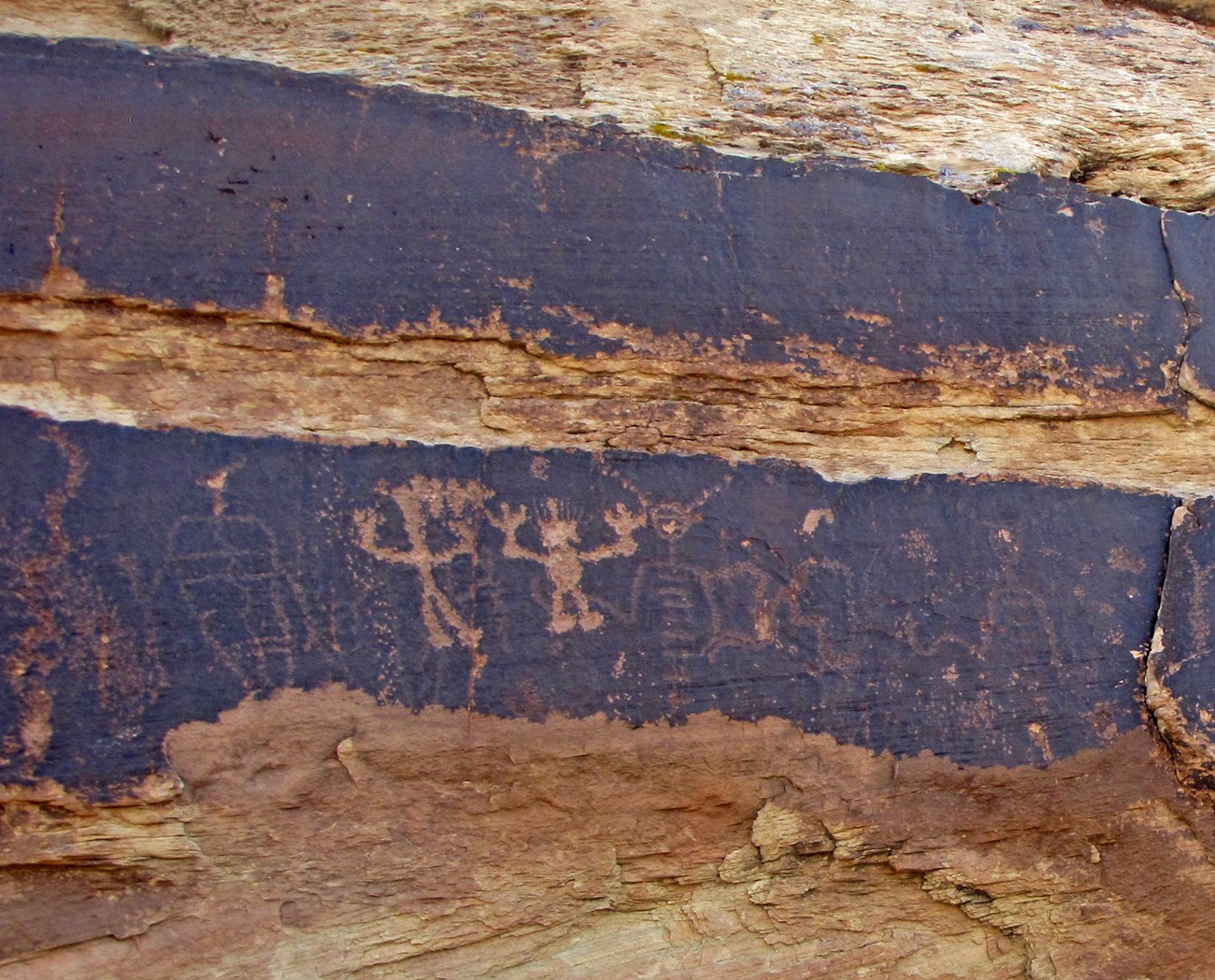 2d-8CD9FDCD-155D-451F-672387EA4A3EEEC5Original Newer petroglyphs at Petrified Forest National Park have brighter lines than older ones.
