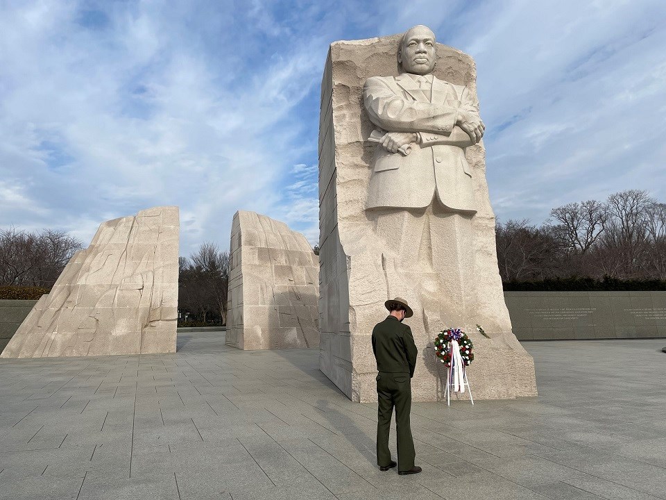 ranger laying a wreath in front of MLK statue