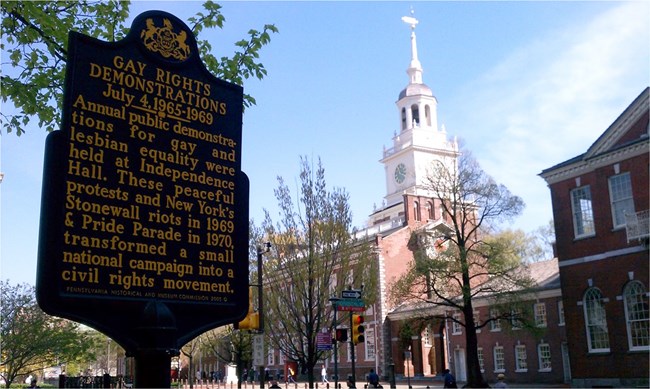 Plaque marking gay rights demonstrations in the 1960s in front of Independence Hall, the building where the Declaration of Independence and Constitution were signed. Histories like this are foregrounded by the National Park Service’s Philadelphia LGBTQ He Plaque marking gay rights demonstrations in the 1960s in front of Independence Hall, the building where the Declaration of Independence and Constitution were signed. Histories like this are foregrounded by the National Park Service’s Philadelphia LGBTQ He