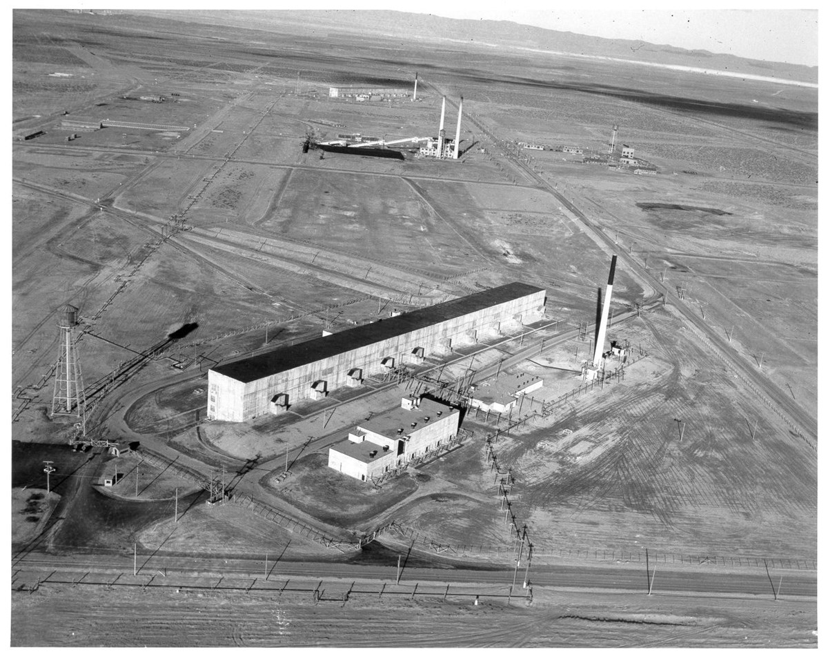 Aerial photo of open expanse with sparse nuclear buildings throughout