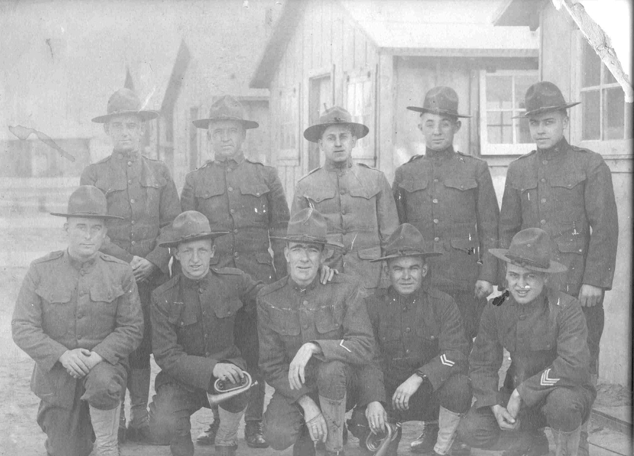WWI soldiers World War I soldiers pose in uniform in front of the barracks