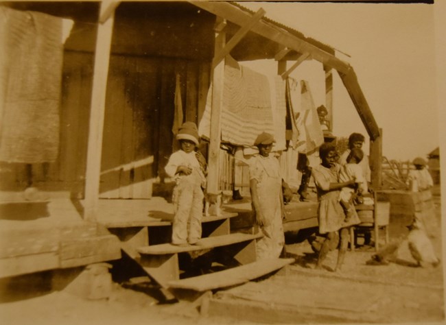 Historic photo of tenant cabin along the Cane River. Historic photo of tenant cabin along the Cane River.