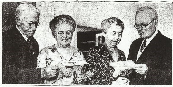 50th-double-wedding-anniversary-the-charlotte-observer-june-16-1938 two older couple standing next to each other and looking down at an article about their weddings