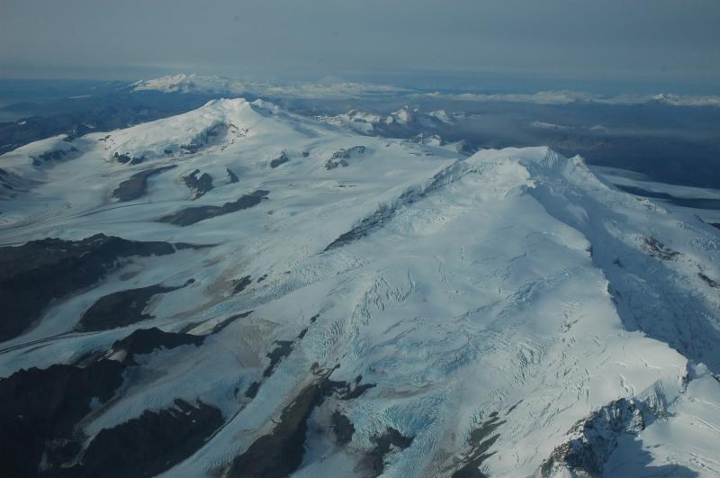 aerial view of snow covered mountain peaks