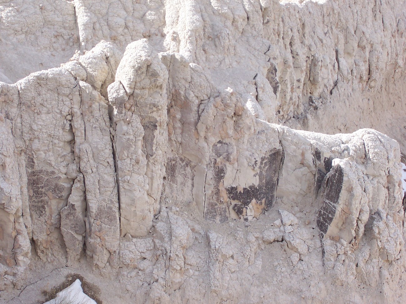 Photo of eroding badlands ash layer.