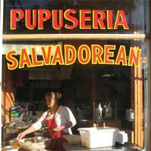 looking in the front window of a pupuseria