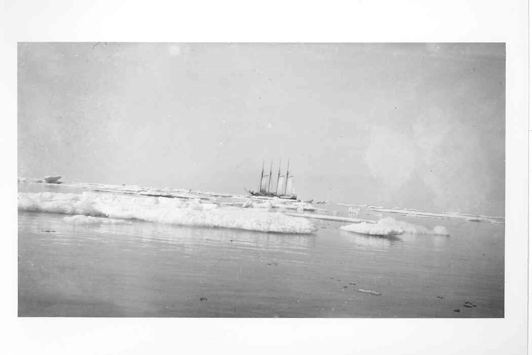 A trading ship on the Chuckchi Sea surrounded by large ice floes. A trading ship on the Chuckchi Sea surrounded by large ice floes.