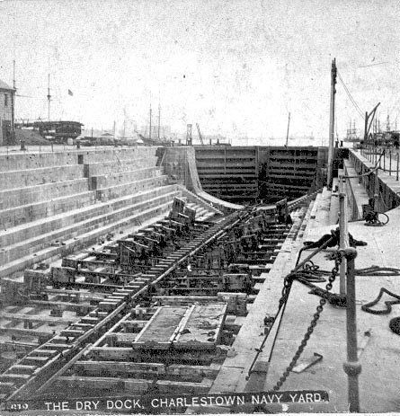 Black and white photograph of an empty dry dock.