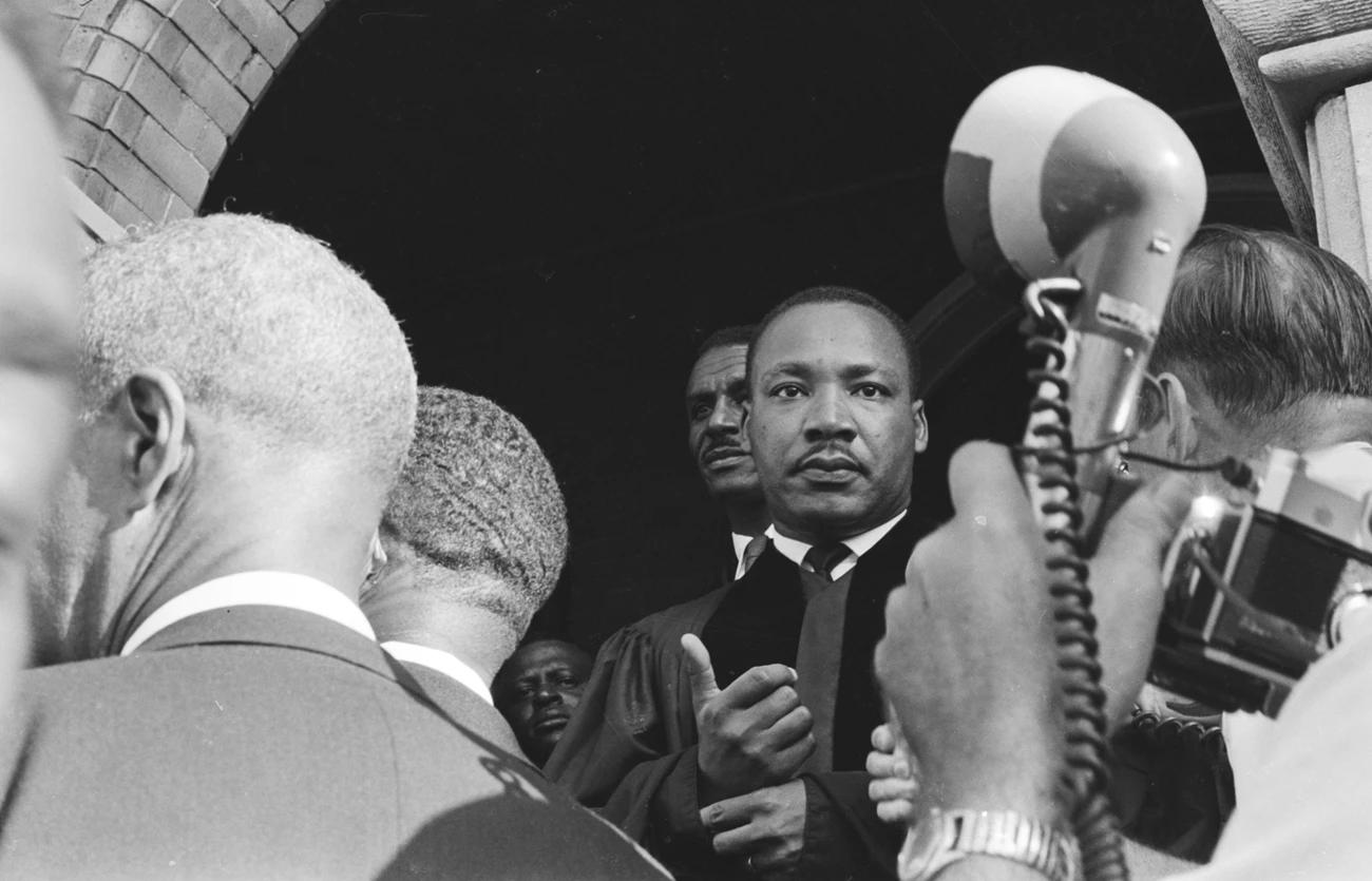 ADAH MLK at the Funeral Dr. King leaving the funeral of the 4 little girls