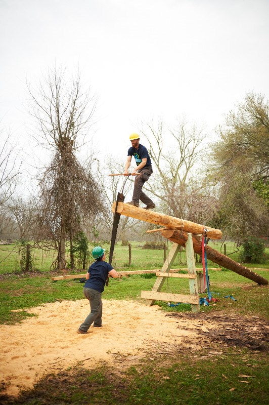 HOPE Crew saws timber for the African House roof structure. HOPE Crew saws timber for the African House roof structure.