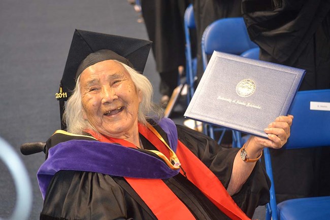 Ahtna_Katie John w Degree_web Katie John shows her honorary law degree.