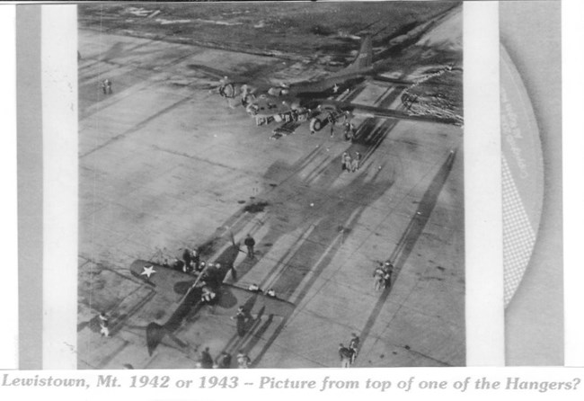 Airport Lewistown View from Top Black and white overhead photo of the tarmac with a plane in the bottom left hand corner