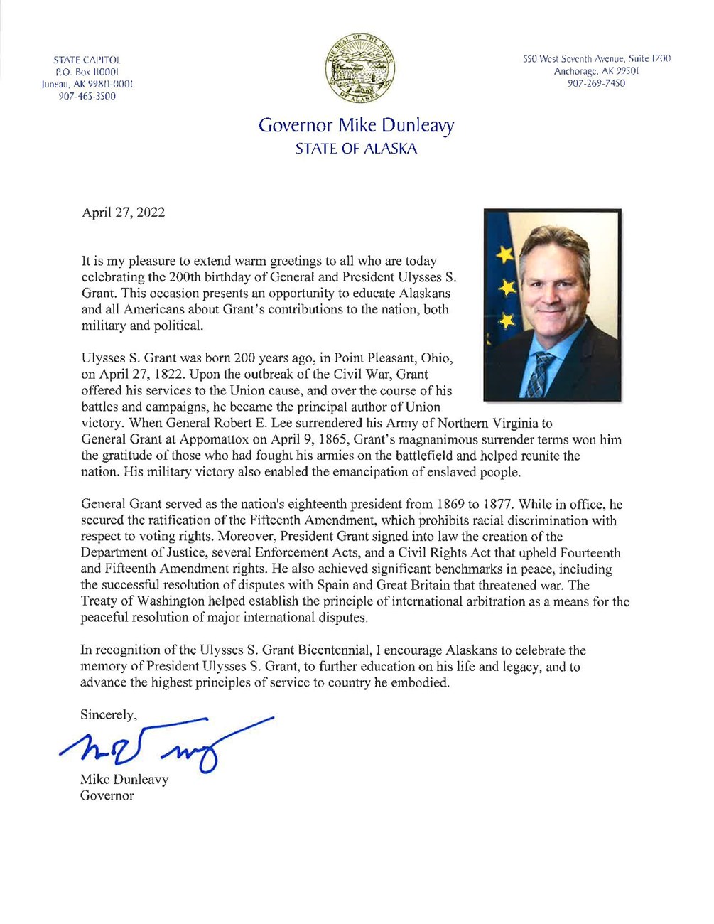 Signed and Sealed message on paper with an image of the governor of Alaska in a suit on it.