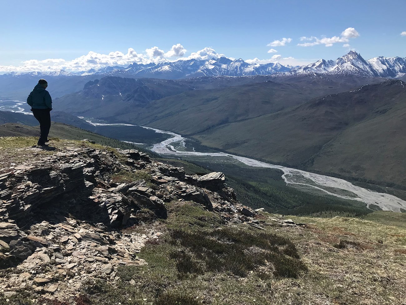 A high-latitude valley looking down from a mountain ridge.