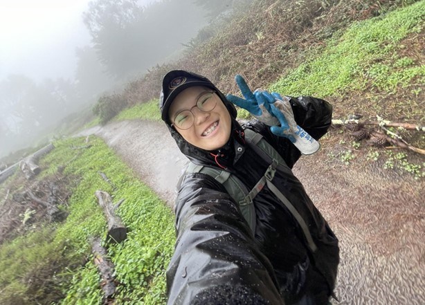 Angie Wu smiling A woman smiling outdoors