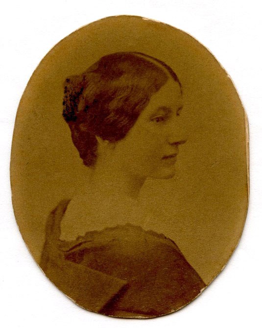 Portrait of a woman in profile cut in oval shape