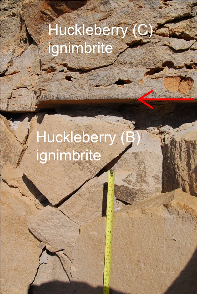 Photo of a rock outcrop showing two different rock layers.