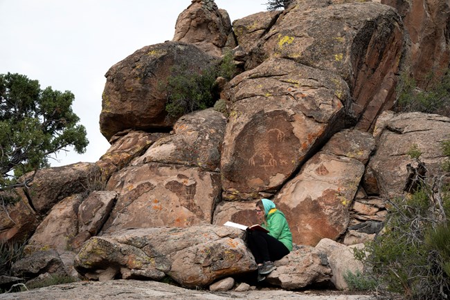 McKenzie writing in Basin and Range National Monument, Nevada