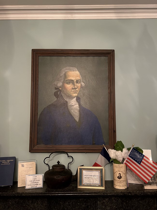 Bigelow Man with white hair wearing colonial clothes