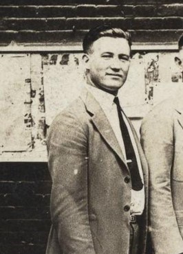 Bill Blizzard photo A man in a suit with swept back hair.