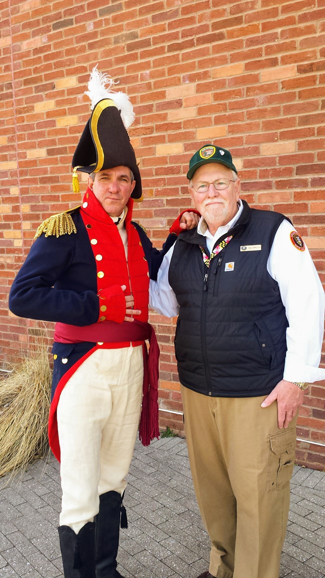Ranger Tim with Bill Picture of Volunteer Bill in his Volunteer uniform next to Ranger Tim in his living history uniform
