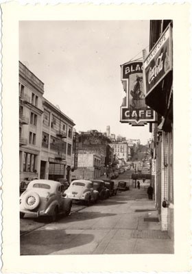 A sign for the Black Cat Cafe