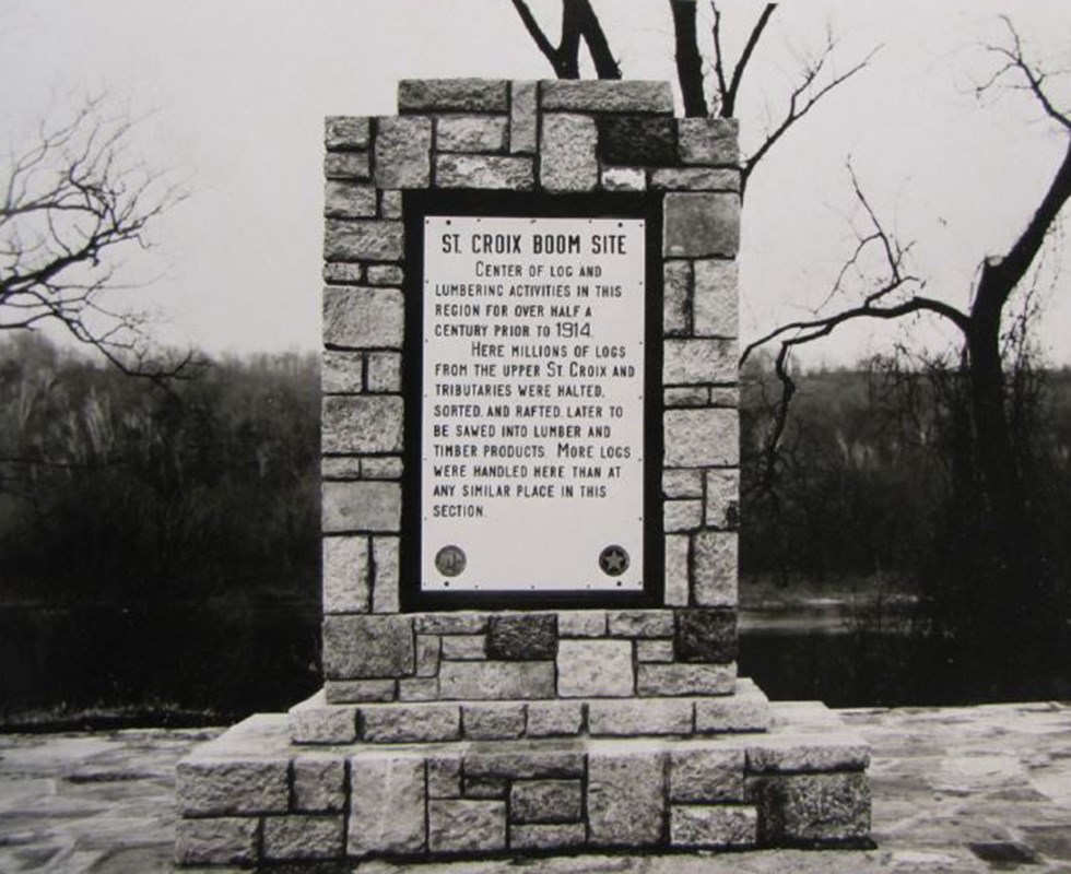 Black and white photo of a history marker.