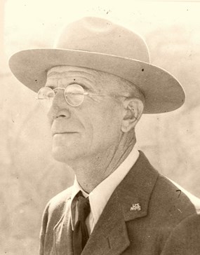 historic photo of man in ranger flat hat