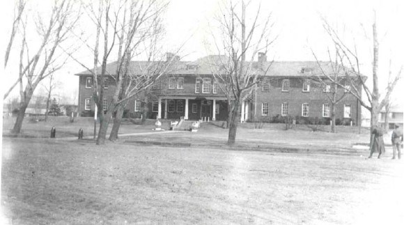 a wide, two-story historic building
