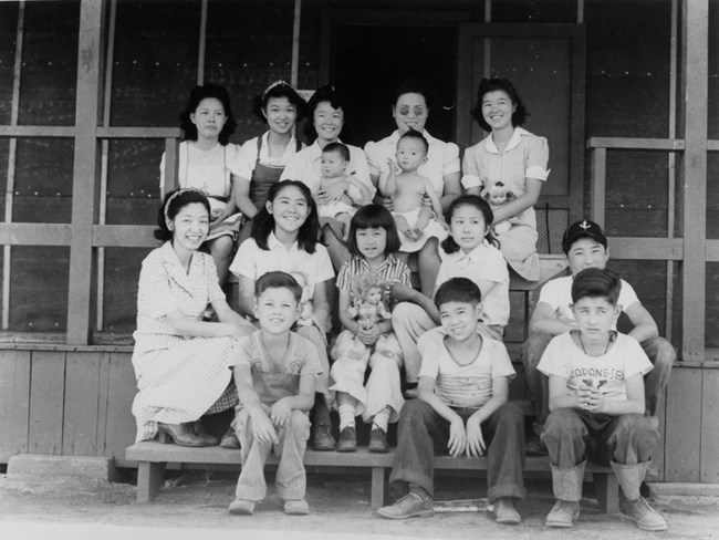 Group of Japanese children of all ages posing in rows of 3