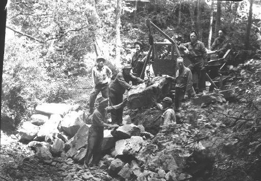 Muir Woods CCC men placing large boulders along Redwood Creek, 1934.