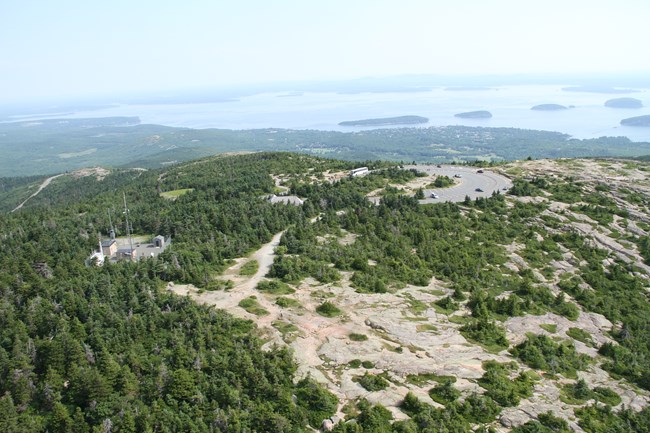 Present day summit with parking area