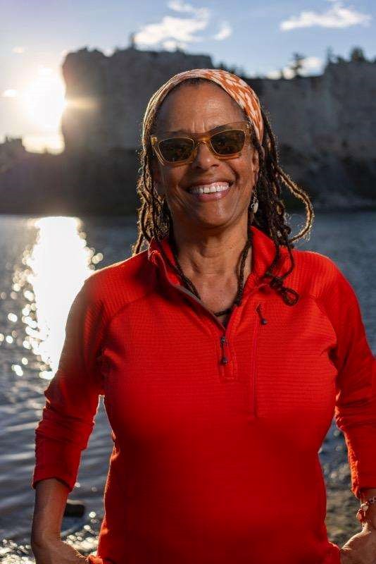Carolyn a black woman wearing sunglasses