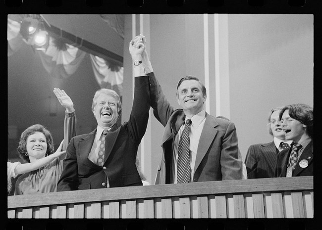 Carter and Mondale Jimmy Carter and Walter Mondale smiling hold up their joined hands