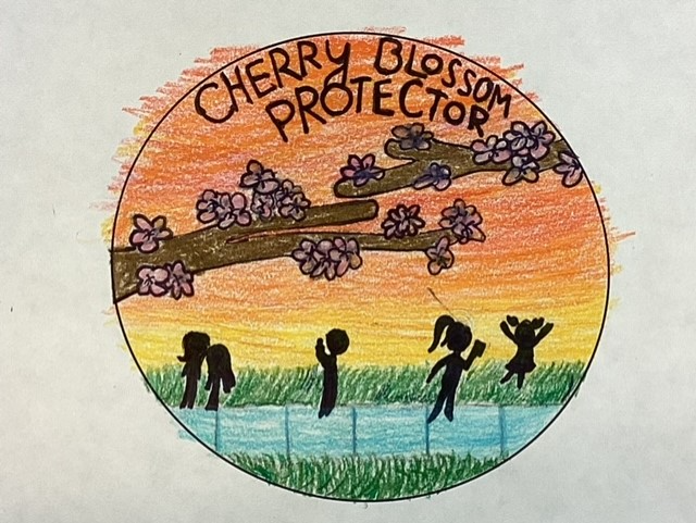 Cherry Blossom Protector Silhouettes Drawing of two blossoming cherry tree branches entering from either side of a circle against a background of an orange and yellow sky. Below the branches, silhouettes of five children talk, read, dance, and wade into a stream with green grass growing on e
