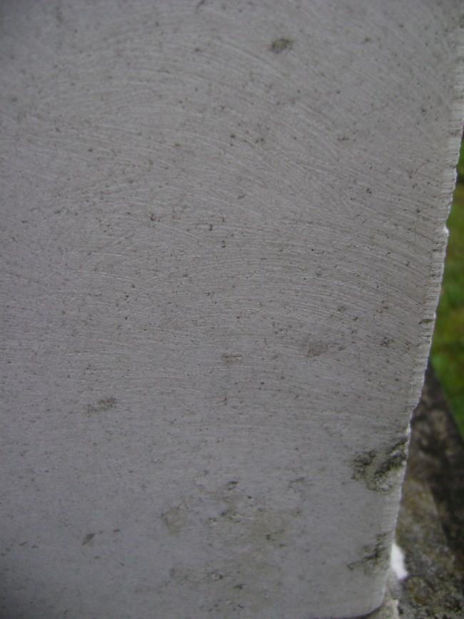 Up close to the cleaned obelisk, serious surface alterations can be seen. Closeup damage detail of the improperly cleaned obelisk.