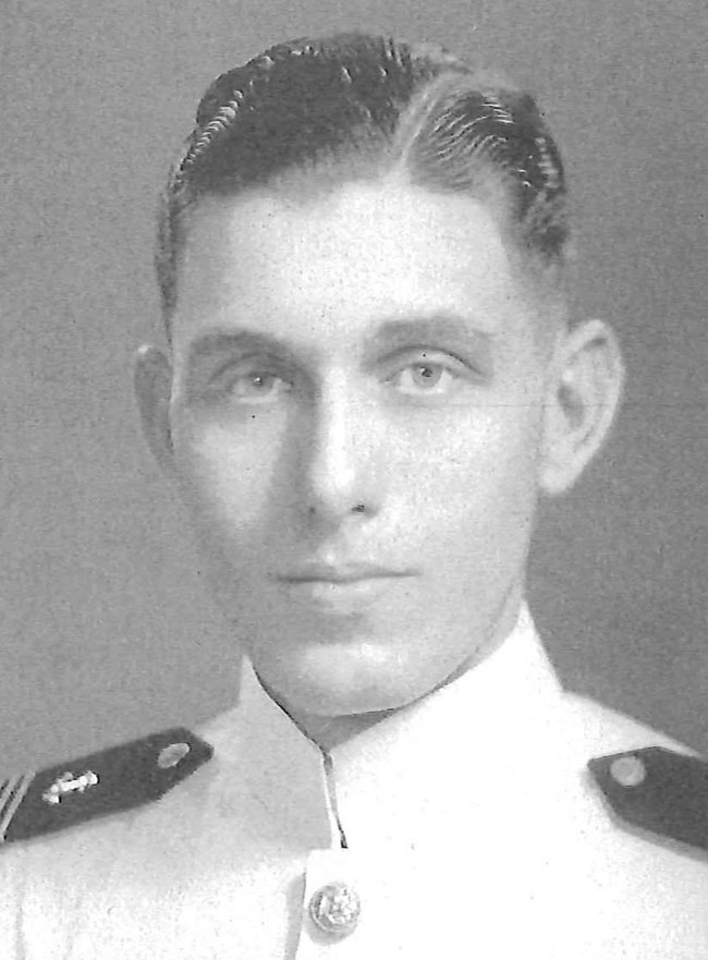 Clifton Bledsoe Cates Jr A man in white high collar military uniform with slicked back hair