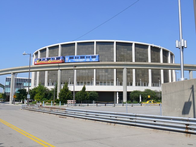 Large building with many glass windows.