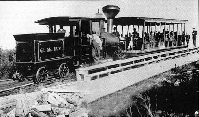 Historic locomotive with riders