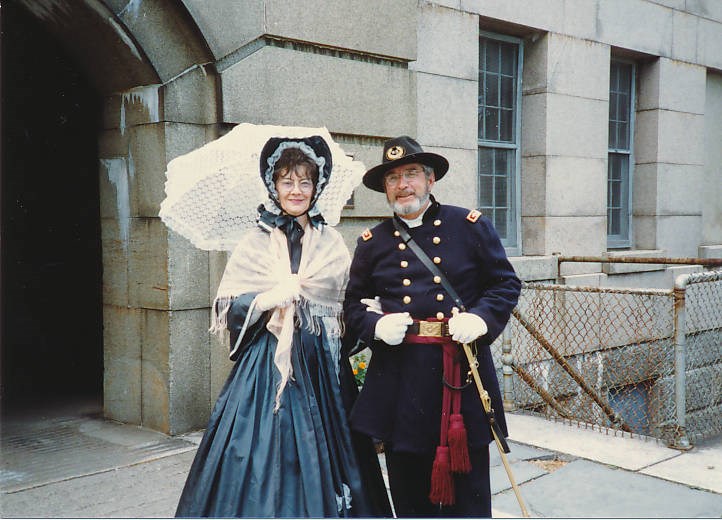 ColonelDimickandWife-Georges-1990-MassMemoriesRoadShow-UMASSBoston a man and a woman dressed in civil war-era clothing in front of a bastion at Fort Warren